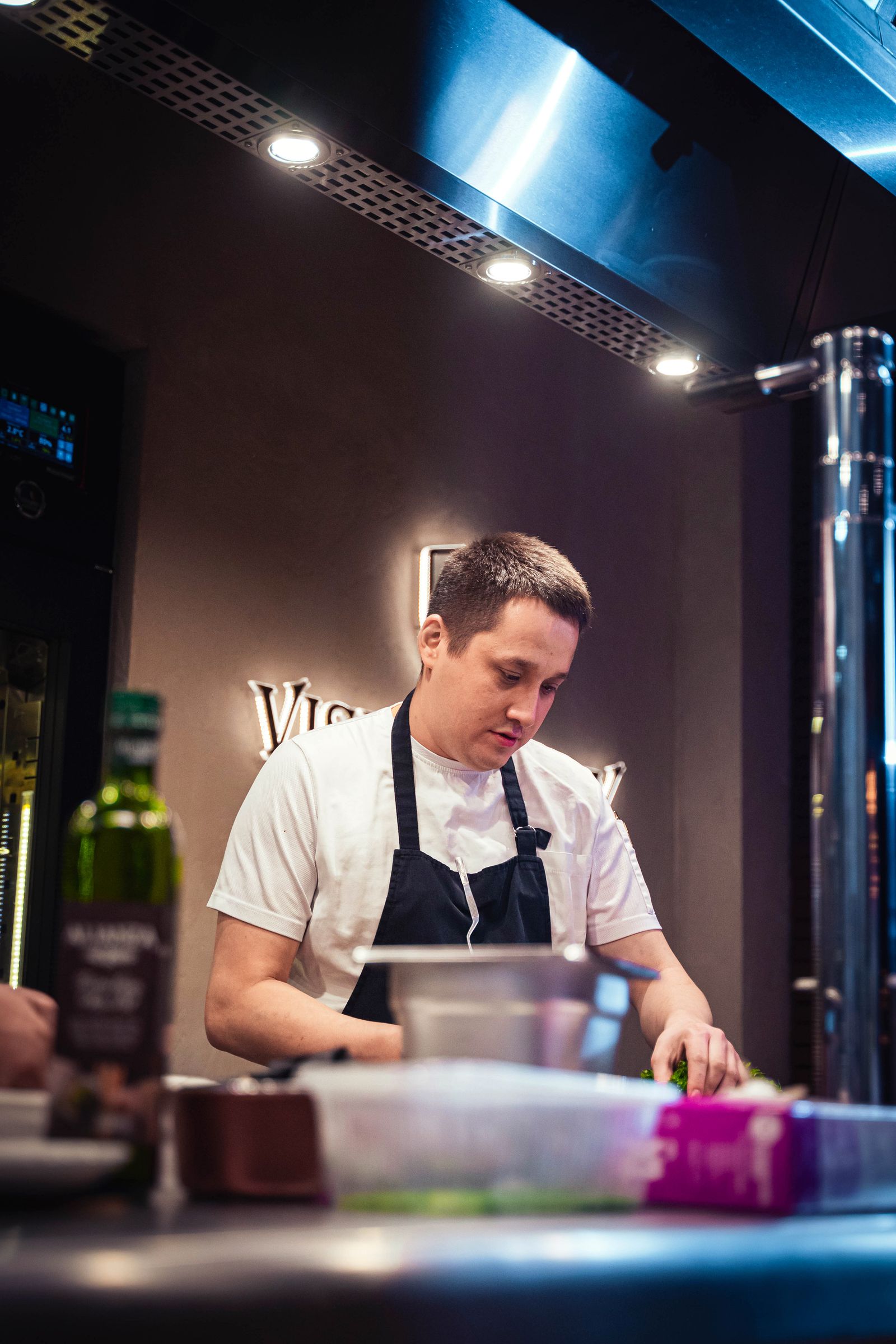 Chef working in a restaurant kitchen — illustrative stock photograph